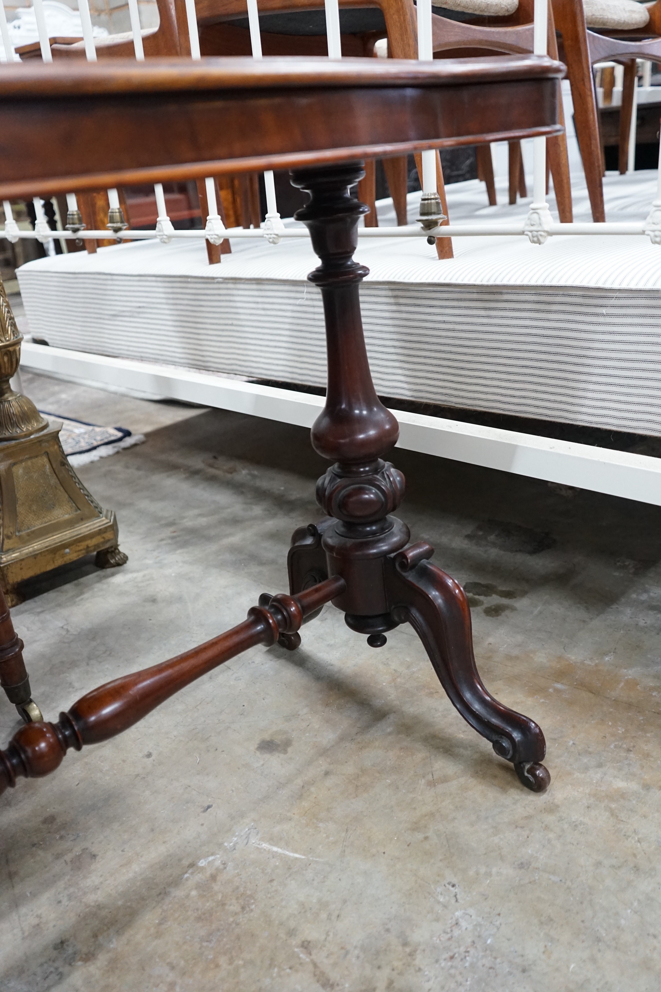 A Victorian mahogany stretcher table, length 106cm, depth 52cm, height 75cm
